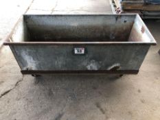 Metal water trough on castors