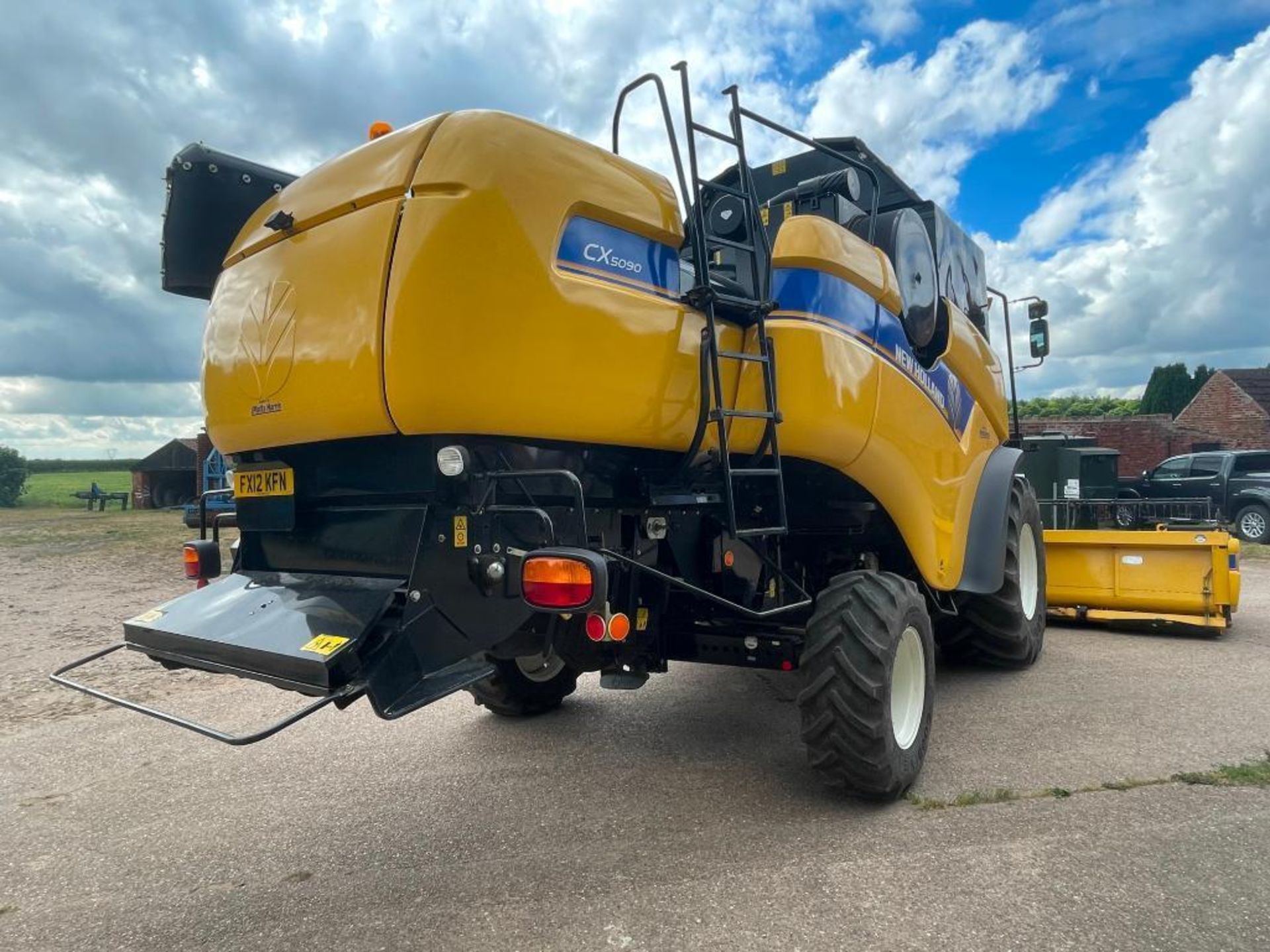 2011 New Holland CX5090 combine harvester with 20ft Varifeed header and trolley and straw chopper on - Image 11 of 33