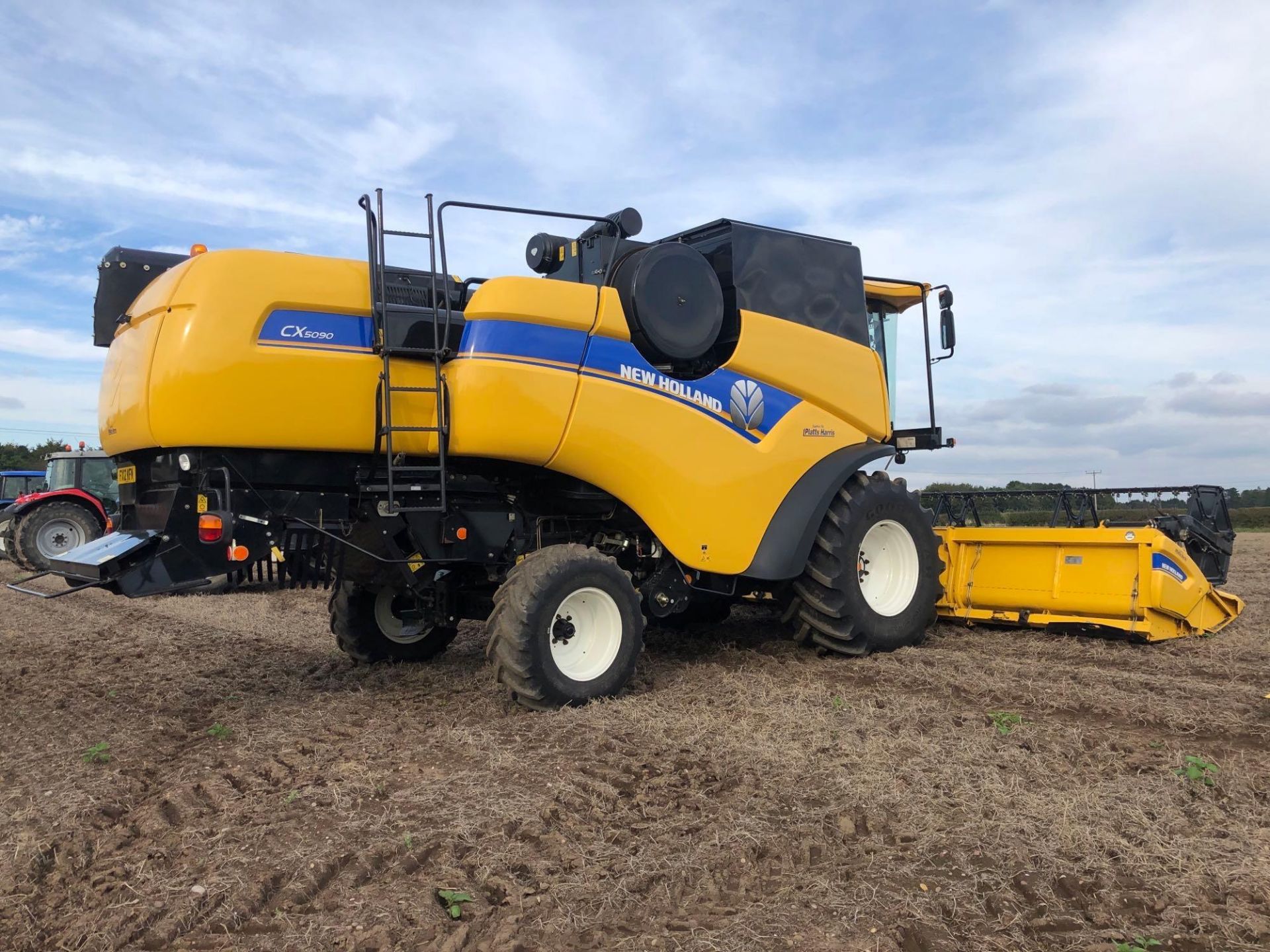 2011 New Holland CX5090 combine harvester with 20ft Varifeed header and trolley and straw chopper on - Image 28 of 33
