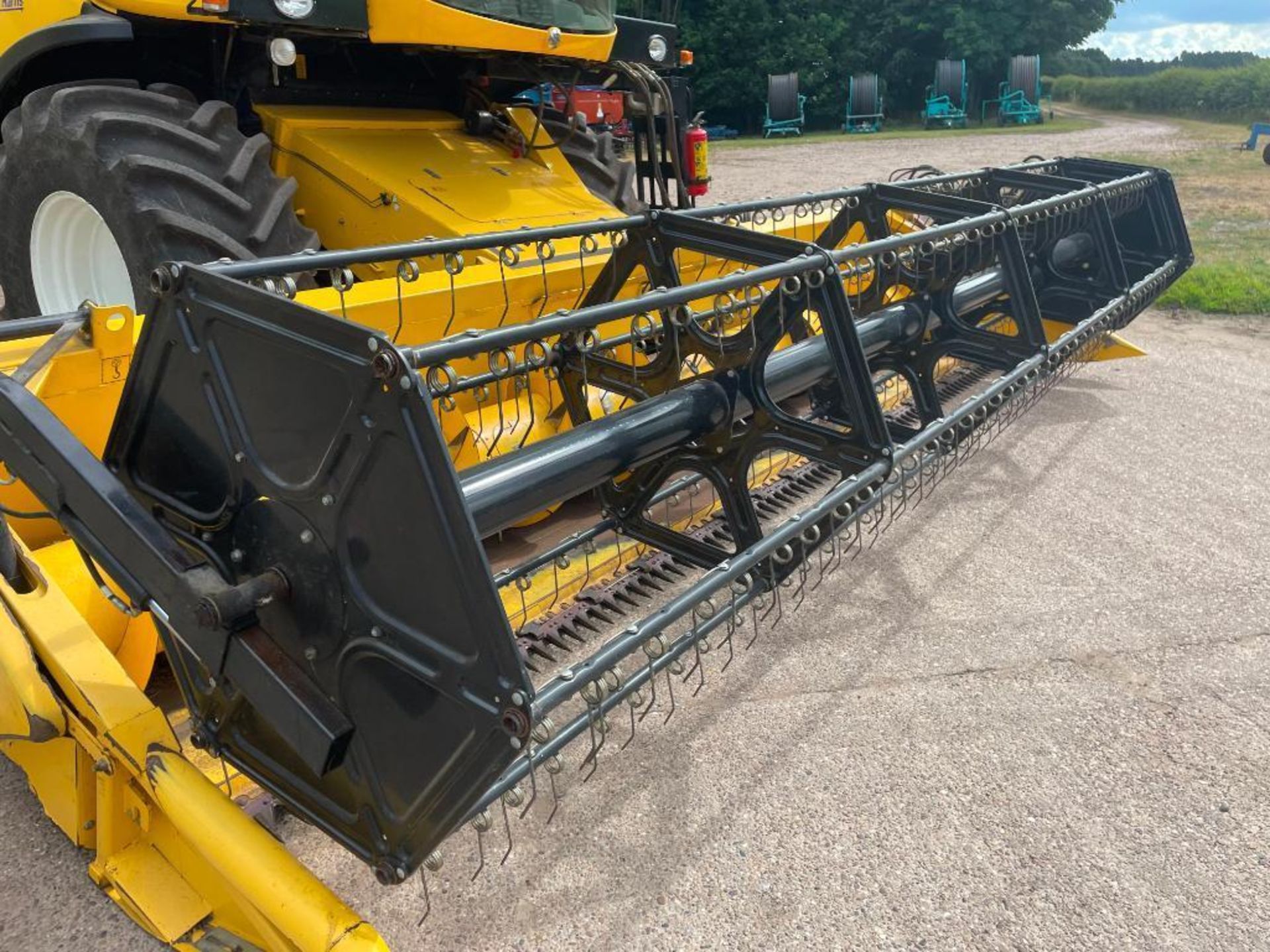 2011 New Holland CX5090 combine harvester with 20ft Varifeed header and trolley and straw chopper on - Image 19 of 33