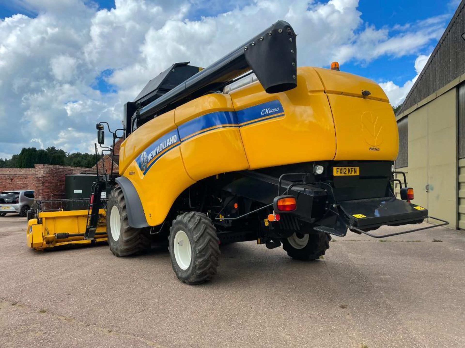 2011 New Holland CX5090 combine harvester with 20ft Varifeed header and trolley and straw chopper on - Image 10 of 33