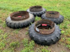 Set Pirelli 12.4R28 front and Firestone 13.6-38 rear Stocks dual wheels and tyres
