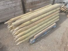 Quantity wooden fence posts