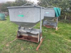 2No galvanised pig feeders with pallet tine attachments