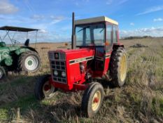 1984 International 785 2wd tractor c/w safety cab. Reg No: B650 BFE. Hours: 5,983 (showing). NO VAT