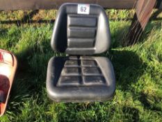 Sprung tractor seat