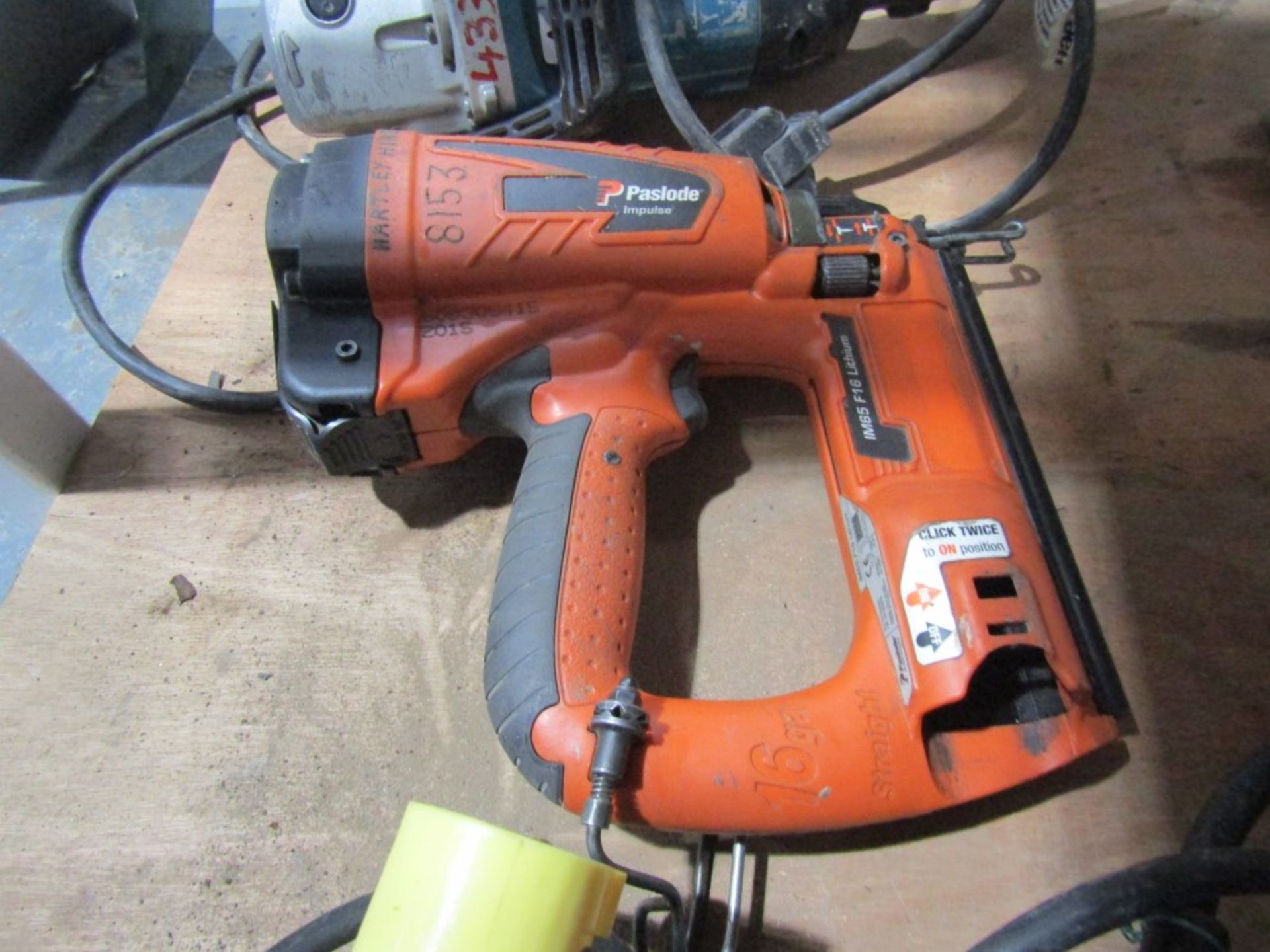 PASLODE IM65 NAIL GUN (DIRECT HIRE CO) [+ VAT]