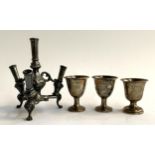 A pewter epergne, 14cmH, together with 3 silver eggcups, approx. 7cmH