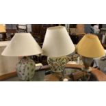 Three ceramic table lamps, with shades