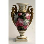 A 19th century urn, hand painted rose decorations, handles in the form of harpies, repaired, on