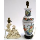Two table lamps, one resin in the form of a putti, 24.5cmH, the other 42.5cmH (2)