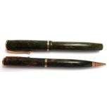 A green marbled Parker fountain pen with 14ct nib, together with a matching Parker pencil; in a Conw