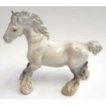 A Beswick grey cantering Shire horse, 21.5cmH