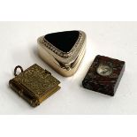 A 925 silver pill box with onyx inset top, 3.5cmW, a gilt metal photograph locket and a compass