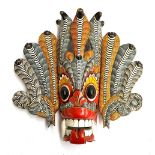 An Sri Lankan wooden Naga Raksha mask, 47cmH