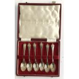 A cased set of 5 silver teaspoons together with one other