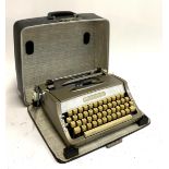A Brother portable typewriter in hard case