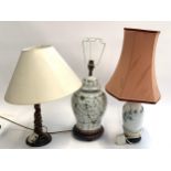 Two baluster ceramic table lamps, an oak barley twist table lamp and one other