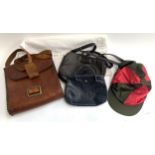 A small leather satchel; a jockey's silk; a Liberty lined handbag; and one other