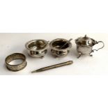 A pair of silver salts with spoons (af), together with silver lidded mustard, silver napkin ring and
