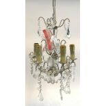 A wrought metal and glass drop 5 arm chandelier, approx 60cmH