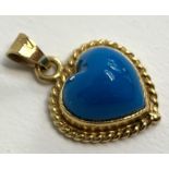 A 14ct gold and turquoise pendant in the form of a heart, 1.5cmW, approx. 2.6g