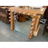 A stage dressing room mirror, with bulb fitting surround, 108x101cm
