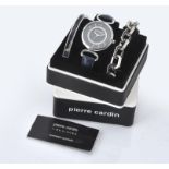Pierre Cardin, a three piece gift set, comprising: a stainless steel wrist watch, quartz movement,