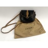 A Celine black and tan leather ladies handbag, with original dust bag, 23cmW