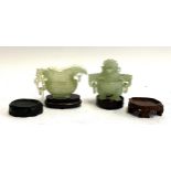 A Chinese celadon jade tripod incense burner, 20th century, 9.5cm high; and a Chinese archaistic