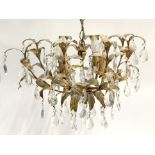 A gilt metal four light fitting acanthus chandelier with cut glass drops, approx. 55cmD