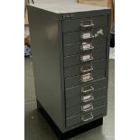 A small multidrawer metal filing cabinet