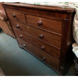 A Victorian mahogany chest of two short over three long drawers, with fluted pilasters,