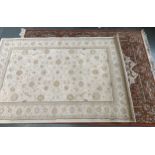 A super Keshan pure wool hand made carpet, 300x200cm, together with two modern rugs, 203x151cm and