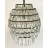 A glass drop 7 tier chandelier, with single central fitting, approx 38cmH