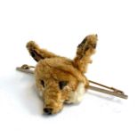 An unusual 19th century fluffy fox mask on yellow metal bar brooch, glass eyes, 7cmL