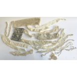 A quantity of fine antique lace trim; together with a fabric Willow pattern pouch