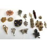 A lot of costume jewellery brooches, to include 925 silver Majorica brooch, 925 silver and carnelian