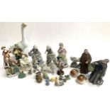 A mixed lot of ceramic figures to include Wade Whimsies