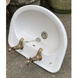 A Twyford wash hand basin with taps, 49x39cm