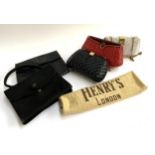 A black suede handbag marked Gucci, fastener af, together with 3 clutch purses, a faux alligator