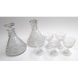 Two cut glass ships decanters, the tallest 22.5cmH, together with 5 Tudor crystal glasses and 4