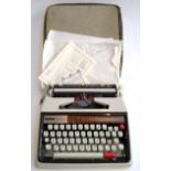 A Brother deluxe 1350 portable typewriter in case