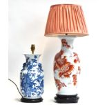 A modern Chinese blue and white lamp base; and an iron red on white modern Chinese lamp base (2)