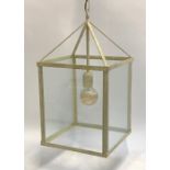 A contemporary metal lantern, 60cmH excluding chain