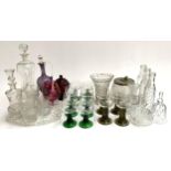 A mixed lot of glass and cut glass items to include decanters, thistle engraved vases and