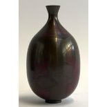 A 20th century Japanese Showa period patinated bronze vase of ovoid form, stamped to base, 15cmH