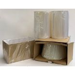 A pair of cylindrical white lampshades, 38cmH; hanging lightshade in box; a rectangular shade