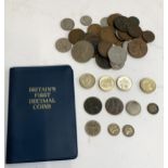 A collection of British and foreign coins to include 10 pfennig 1875, 3 pence coin 1919, 1922 (2),