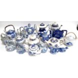 A mixed lot of 18 blue and white teapots to include Arthur Wood, Booths Willow, Frank Beargmore,